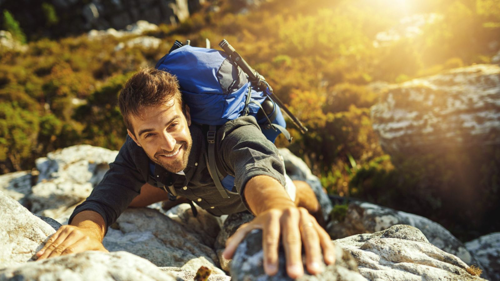 Man hiking up on a mountain