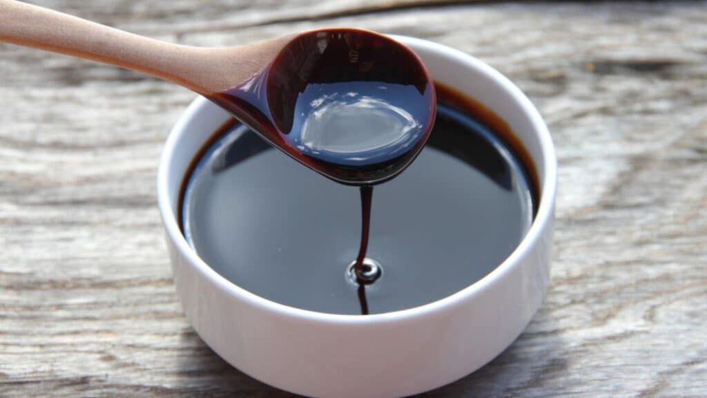 Molasses that remains as a residue from the crystallization of cane sugar and is used as food and rum production